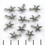 charm starfish dotted - silver