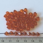 acrylic faceted conical 6 mm - orange brown