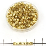 Czech faceted round 4 mm - crystal gold topaz