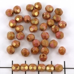 Czech faceted round 6 mm - opaque rose gold topaz