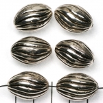 oval with wavy stripes 22 mm - silver