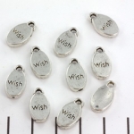 charm oval with quote - wish