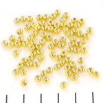 bead round with rubber inside - gold 4 mm disc