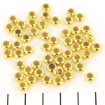 bead with rubber inside - gold 6 mm disc