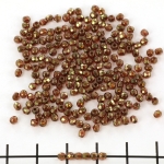 Czech faceted round 2 mm - luster rose gold topaz