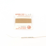 zijde draad met naald 0.65 mm - beige