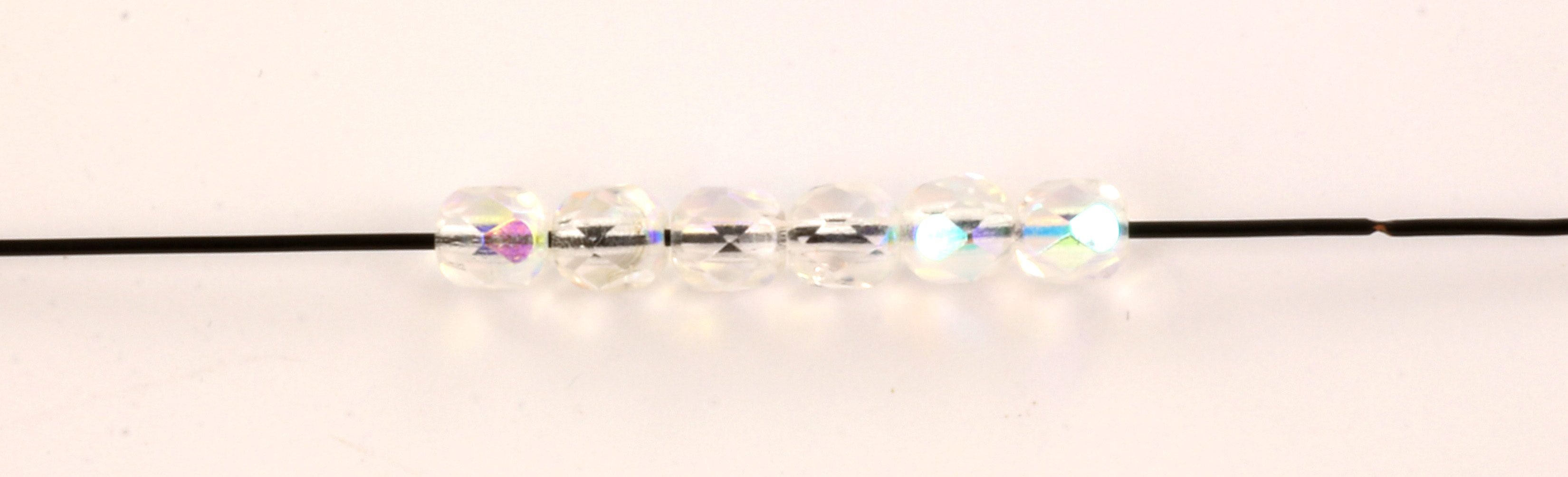 Extra pictures Czech faceted round 4 mm - crystal ab