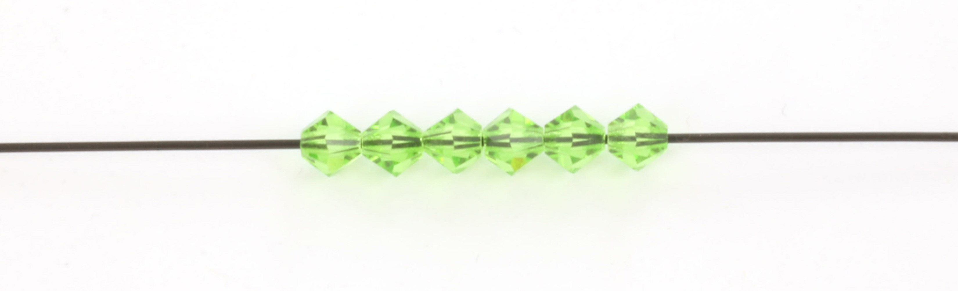 Extra foto's preciosa bicone 4 mm - peridot